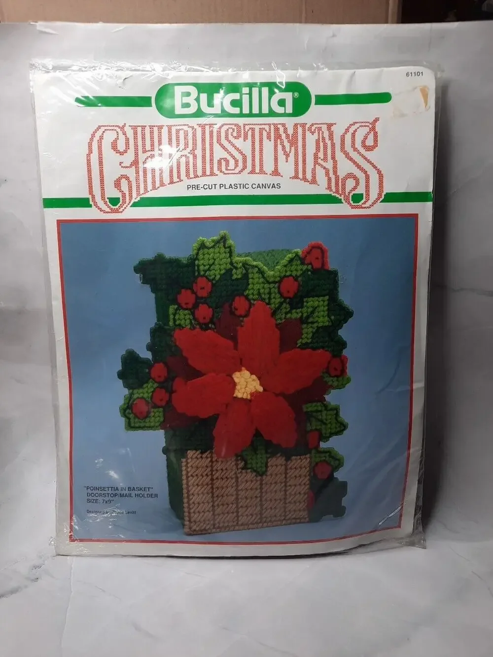 Vintage Bucilla Christmas Plastic Canvas Kit Poinsettia In Basket Doorstop